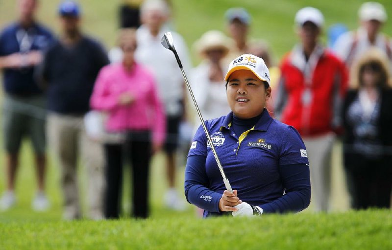 Inbee Park wathces her eagle on 14 from the bunker during the second round of the LPGA Championship golf tournament, Friday, Aug. 15, 2014, in Pittsford, N.Y. (AP Photo/Democrat & Chronicle, Shawn Dowd)