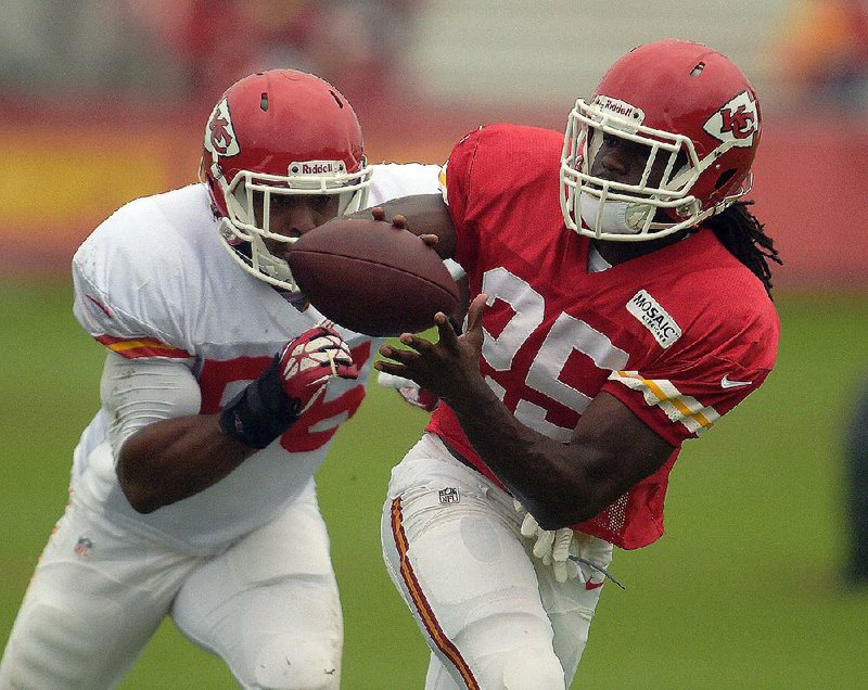 Kansas City Chiefs back Jamaal Charles (25) makes a reception during practice Sunday morning, Aug. 10, 2014, on the Missouri Western State University campus in St. Joseph. Mo. (AP Photo/St. Joseph News-Press, Todd Weddle)