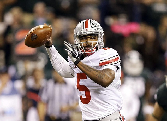 Ohio State quarterback Braxton Miller injured his throwing shoulder during Monday’s practice on a routine roll-out pass. He was a three-year starter for the Buckeyes.