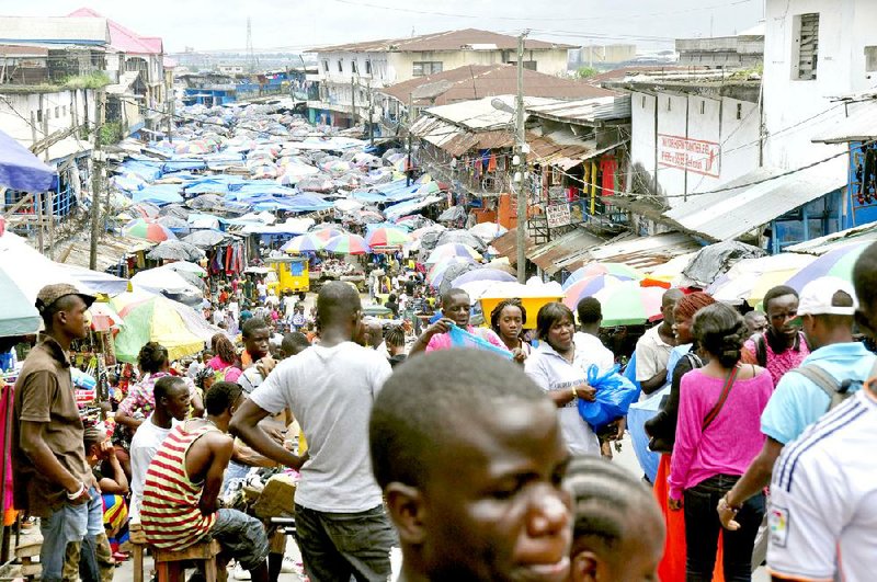 A market in the center of Monrovia, Liberia, is jammed with shoppers Tuesday despite fears of the spread of the Ebola virus.