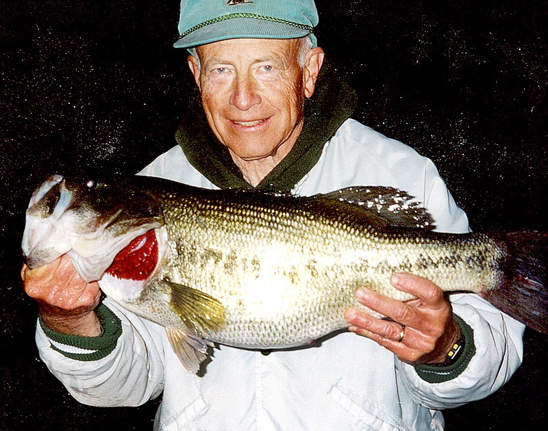 Submitted Night anglers don&#8217;t take a lot of photos, Charles Harp explained. His friend, Dee Roy, is shown at Lake Windsor at 1 a.m. a few years back with the biggest fish he ever caught, a 9.95-pound bass.