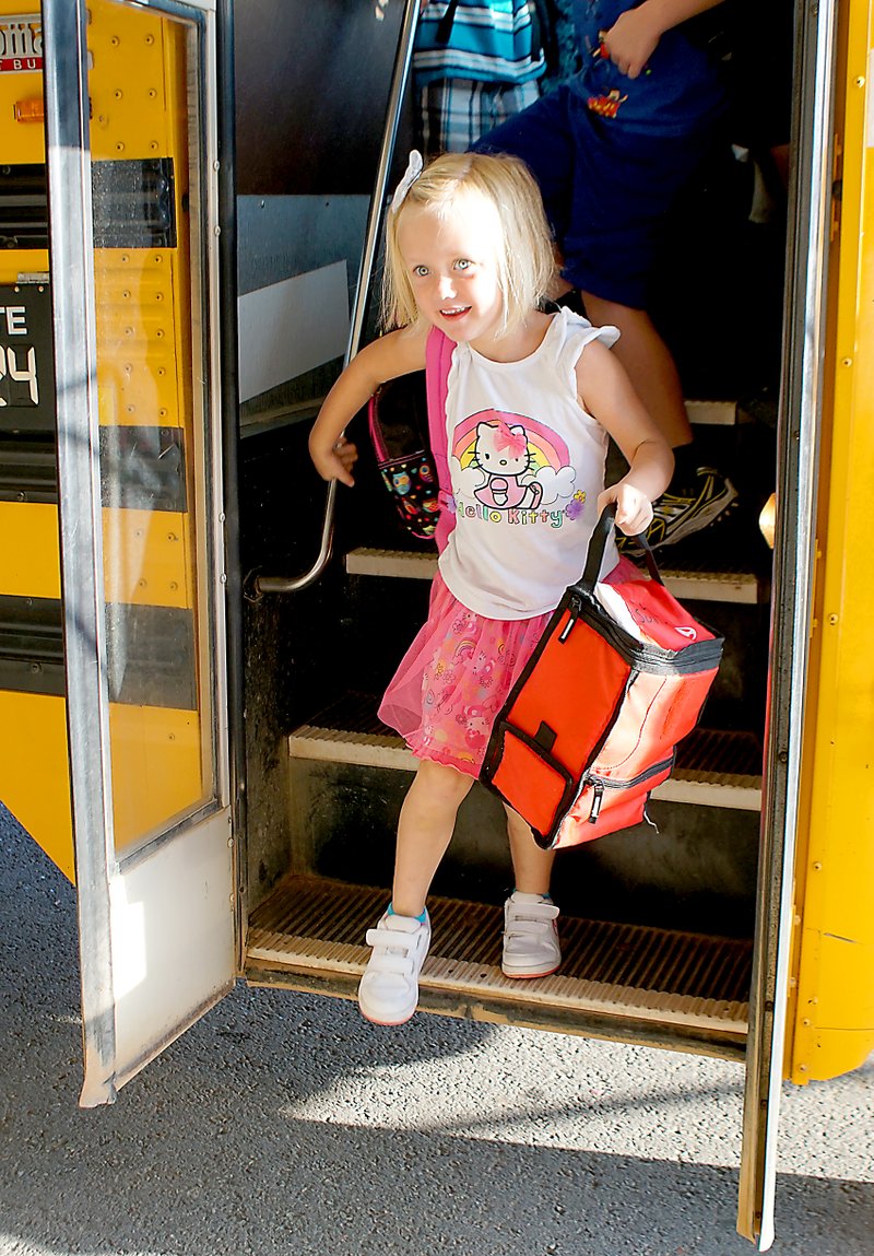 Photo by Randy Moll Students arrived for their first day of classes Monday in Gentry, as well as in Gravette and Decatur. Though bus numbers are usually low on the first days, many students still arrived by school bus.