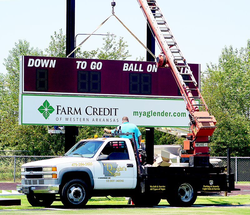 Photo by Randy Moll A new scoreboard was erected last week in Pioneer Stadium. The board, at a price tag of near $18,000, was donated to Gentry High School by Farm Credit of Western Arkansas.