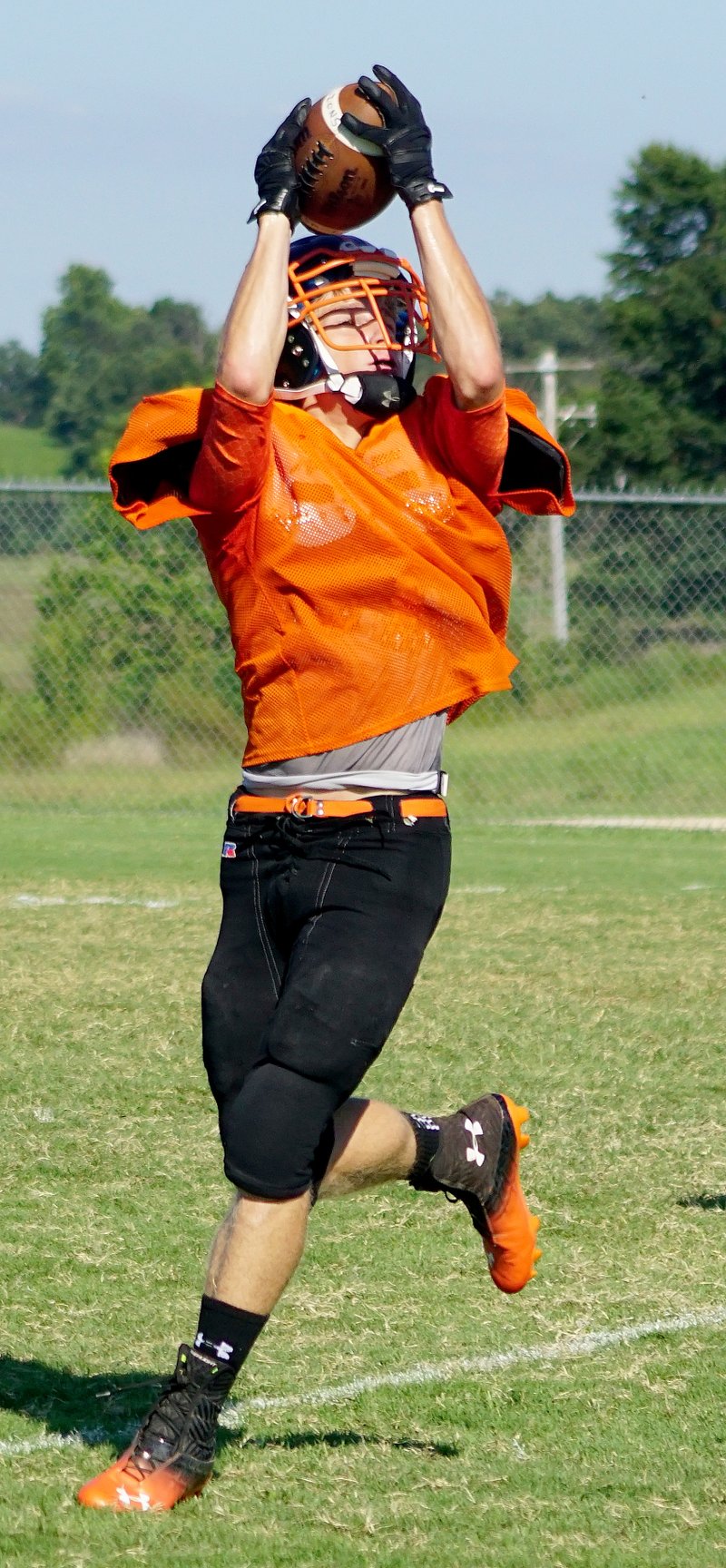 Photo by Randy Moll Brady Rolsma catches a pass during practice in Gravette last week. The Lions were busy preparing for the upcoming season.