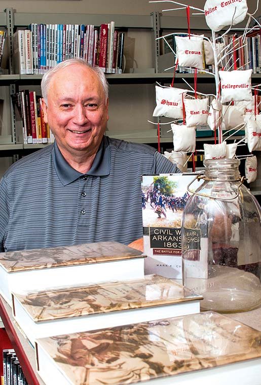 Steve Perdue, head of genealogy and local history for the Saline County Library, stands in the documents and artifacts section of the library. Perdue is preparing for the Arkansas Genealogical Society’s annual meeting, set for Sept. 20 at the Benton Event Center.