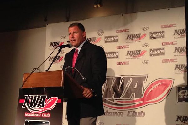 Former Rutgers University and Tampa Bay Buccaneers head football coach Greg Schiano speaks to the Northwest Arkansas Touchdown Club on Wednesday, Aug. 20, 2014 at Mermaids restaurant in Fayetteville. 