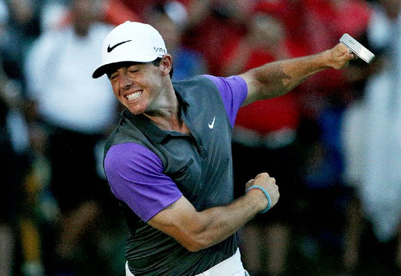 Rory McIlroy celebrates his victory in the PGA Championship at Valhalla Golf Club in Louisville, Ky. He begins his drive for the FedEx Cup title today at The Barclays in Paramus, N.J.