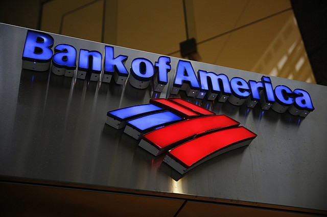 This Tuesday, Jan. 14, 2014 file photo shows a Bank of America sign in Philadelphia. Officials familiar with the deal say Bank of America on Wednesday, Aug. 20, 2014 has reached a record $17 billion settlement with federal and state authorities over its role in the sale of mortgage-backed securities in the run-up to the 2008 financial crisis.