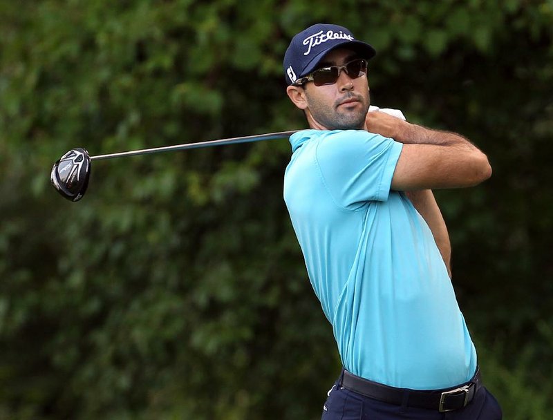 Cameron Tringale tees off on the fourth hole during first-round play at The Barclays golf tournament Thursday, Aug. 21, 2014, in Paramus, NJ. (AP Photo/Adam Hunger)