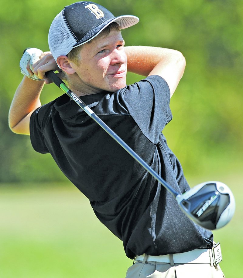  STAFF PHOTO ANDY SHUPE Bentonville&#8217;s Tomas Marascotti watches his tee shot on the fifth hole during a match Thursday at Razorback Golf Course in Fayetteville. Visit photos.nwaonline.com to see more photographs from the match.
