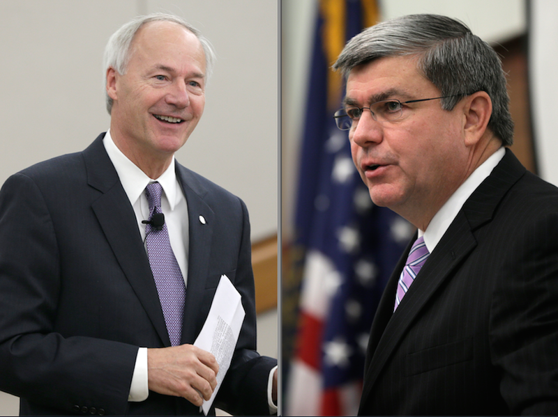 Republican candidate for Arkansas governor Asa Hutchinson and Democratic candidate Mike Ross speak to members of the Delta Regional Authority in Pine Bluff on Wednesday, Aug. 13, 2014. 