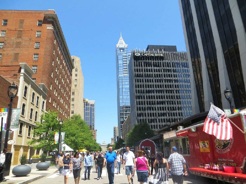 In Raleigh, North Carolina, Fayetteville Street is the site of many special events, including the Downtown Raleigh Food Truck Rodeo. Illustrates TRAVEL-RALEIGH (category t), by Andrea Sachs © 2014, The Washington Post. Moved Tuesday, Aug. 12, 2014. (MUST CREDIT: Washington Post photo by Andrea Sachs)