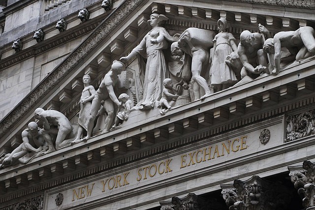 This Aug. 19, 2013 file photo shows the New York Stock Exchange in New York.  European stock markets turned lower on Friday, Aug. 22, 2014, while Wall Street was expected to open flat, amid concerns of an escalation in the Ukrainian crisis after a Russian aid convoy entered the country.
