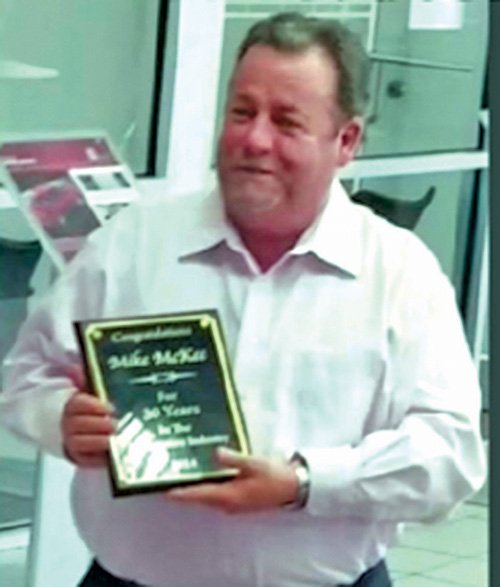 Submitted photo Mike McKee, with Riser Nissan, recently celebrated 30 years in the automotive industry. He was presented with a plaque.