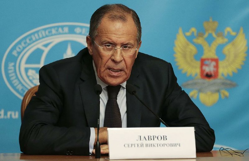 Russia's Foreign Minister Sergey Lavrov speaks in Moscow, Russia, Monday, Aug. 25, 2014. Russia has announced plans to send a second aid convoy to rebel-held eastern Ukraine, where months of fighting have left many residential buildings in ruins. Lavrov said Monday that Russia had notified the Ukrainian government that it was preparing to send a second convoy along the same route in the coming days.  (AP Photo/Ivan Sekretarev)