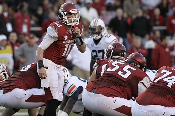 In this Nov. 2, 2013, file photo, Arkansas quarterback Brandon Allen (10) calls a play in the first half of an NCAA college football game against Auburn in Fayetteville. (AP Photo/Danny Johnston, File)