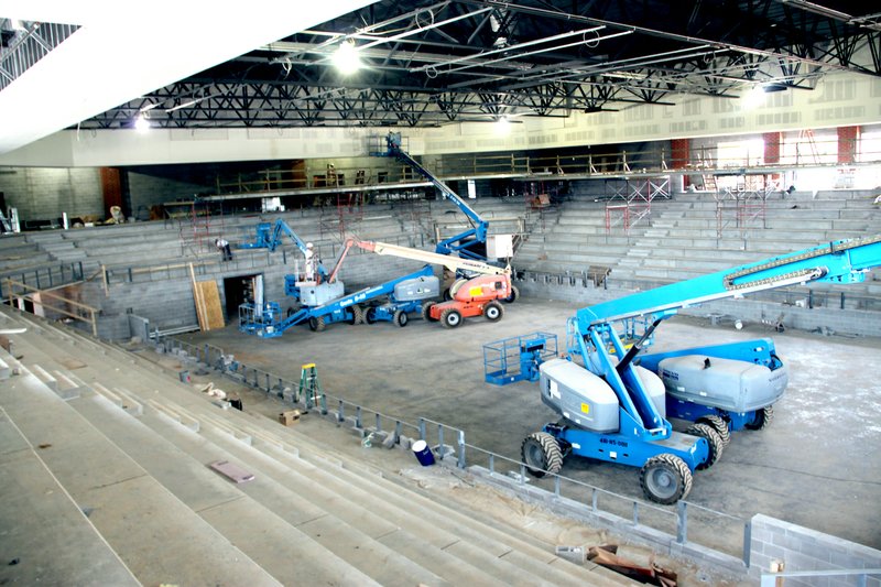 LYNN KUTTER ENTERPRISE-LEADER Work continues on the new competitive basketball arena for Farmington High School. This view shows the height of the inside, the court and seated area. The gym will have chairback seats, except for the four corners, which will be bleachers. Amenities will include state-of-the-art scoreboards and video boards, as recently approved by the School Board.