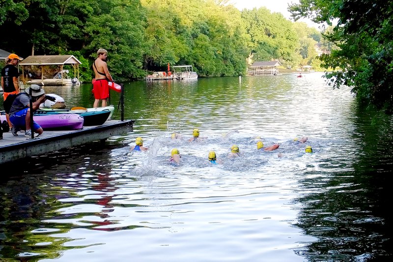 Lynn Atkins/The Weekly Vista Women doing the sprint distance take off on the first leg of the Memory Maker triathlon Saturday at London Landing park.