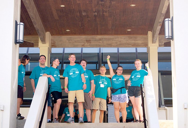 Photo submitted Orientation leaders prepare to unload cars and welcome freshman to the newly renovated J. Alvin Brown Hall.
