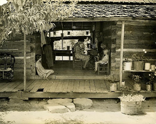 A dogtrot house, with a middle passageway, was designed to keep its occupants as cool as possible during hot days before electric fans and air conditioning. The house in this undated photograph was a few miles from Calico Rock.
