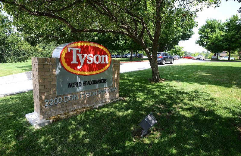 Tyson Foods Inc. has agreed to sell its Heinold Hog Markets division, clearing the way for its $7.8 billion acquisition of Hillshire Brands Co.