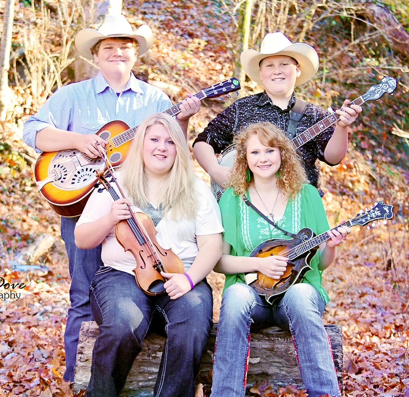 COURTESY PHOTO Rebekah Clay, Levi Clay, Hannah Cowin and Matthew Cowin form the group Ozark Wildfire.