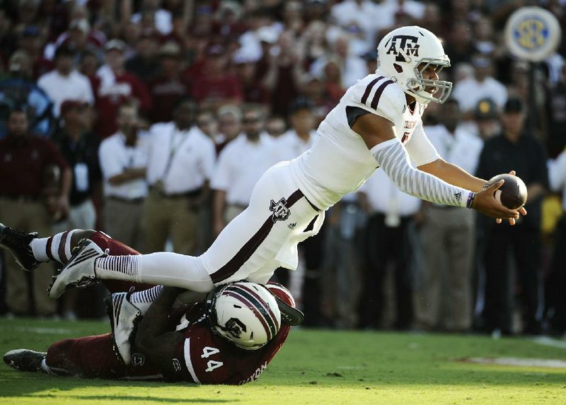 Texas A&M quarterback Kenny Hill made a successful debut Thursday night and broke a school record in the process. Hill completed 44 of 60 passes for a single-game record 511 yards and 3 touchdowns in the Aggies’ season-opening victory over South Carolina.