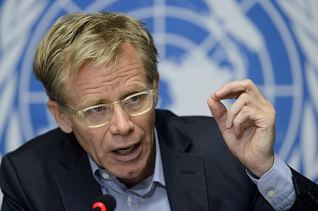 Bruce Aylward, WHO Assistant Director-General, speaks to the media during a press conference about the WHO briefing on the Ebola roadmap. It outlines all actions that need to be taken by affected countries and partners to bring an end to the largest and most complex recorded Ebola outbreak in history, at the European headquarters of the United Nations in Geneva, Switzerland, Thursday, August 28, 2014. (AP Photo/Keystone/Martial Trezzini)