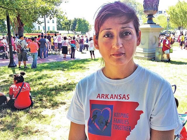 STEPHENS WASHINGTON BUREAU PETER URBAN Beatriz Salas of Rogers, joined demonstrates at the White House on Thursday urging immigration reform.