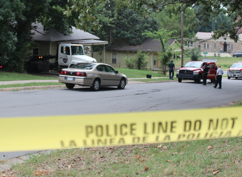 Little Rock police on Friday, Aug. 29, 2014, investigate two suspicious deaths in the 2600 block of Spring Street.