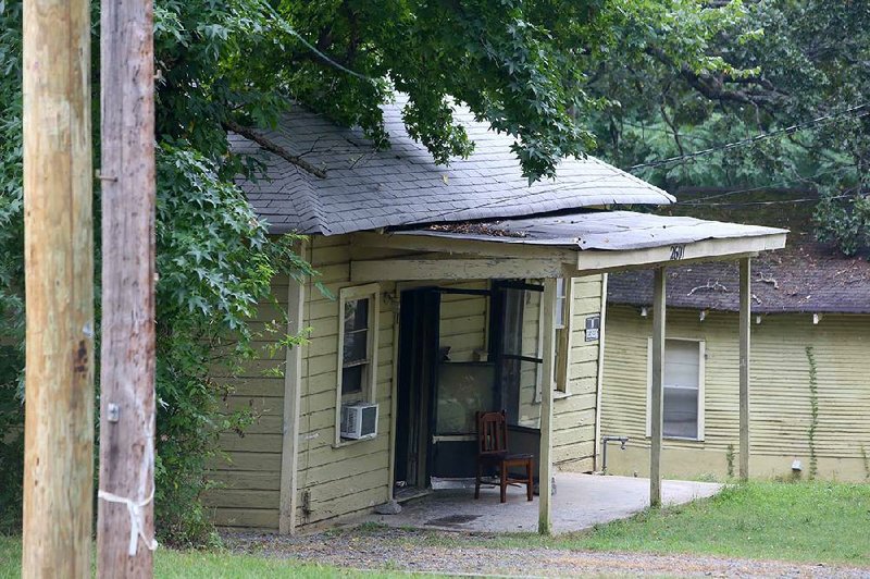 8/28/14
Arkansas Democrat-Gazette/STEPHEN B. THORNTON
Two people were  found dead in this home in the 2600 block of S. Spring Street Friday morning in Little Rock. The Little Rock Police Department have ruled them as homicides.