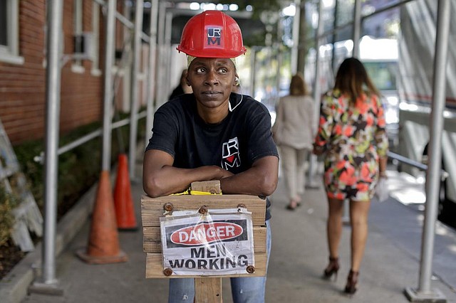 Sophia McIntosh stands outside a construction site in New York where she works as a shop steward. 