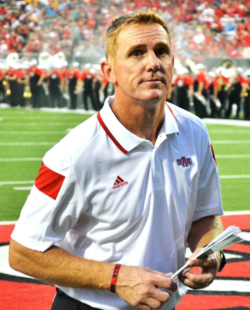 Special to the Arkansas Democrat-Gazette - 8/30/14 - Arkansas State head coach Blake Anderson walks off the field after the second quarter of the Red Wolves season opener at Centennial Bank Stadium in Jonesboro on Aug. 30, 2014.