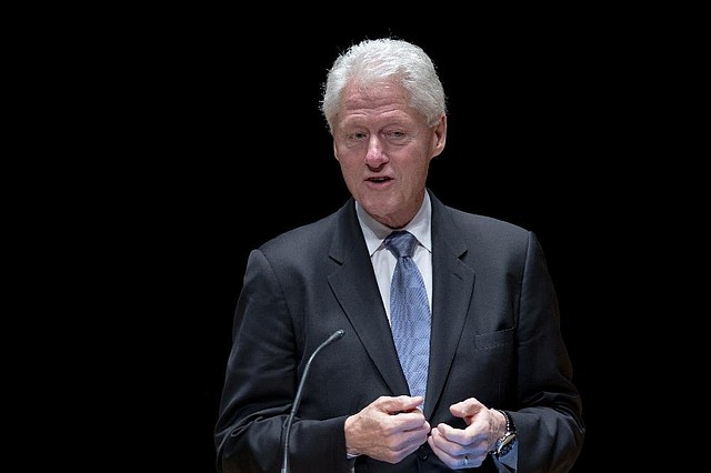 Former President Bill Clinton speaks during a public memorial service for Philadelphia Inquirer co-owner Lewis Katz Wednesday, June 4, 2014, at Temple University in Philadelphia. Katz and six others died when his private jet crashed during takeoff on Saturday, May 31, 2014, in Massachusetts. He was 72. (AP Photo/Matt Rourke)