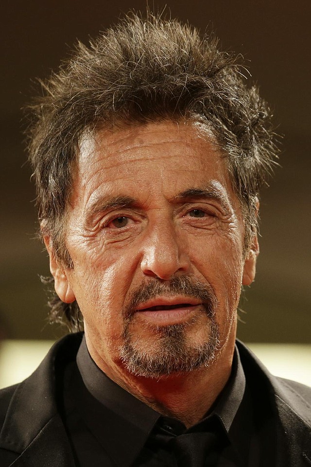 Actor Al Pacino poses for photographers as he arrives for the screening of the movie 'The Humbling' at the 71st edition of the Venice Film Festival in Venice, Italy, Saturday, Aug. 30, 2014. (AP Photo/David Azia)