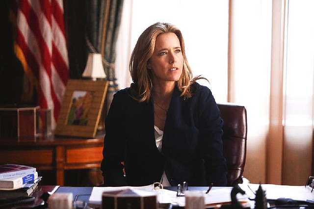 This image released by CBS shows Tea Leoni as Elizabeth McCord, the shrewd, determined, newly appointed Secretary of State in "Madam Secretary," premiering Sept. 21. (AP Photo/CBS, Craig Blankenhorn)