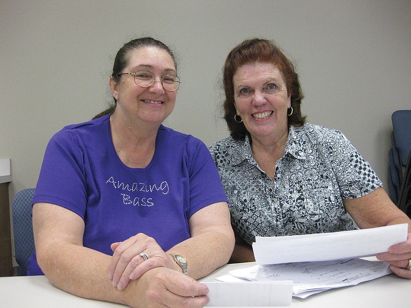 Submitted photo Kathy Skinner, left, and Joan Voeks look over tickets for the Sweet Adelines Crystal Chimes Chorus Show &#8220;Mardi Gras or Bust,&#8221; which will begin at 7 p.m. Sept. 20 at Woodlands Auditorium. Tickets are $10 and are available online at http://www.woodlandticketsales.com, or by calling Skinner at 972-978-3974 or Voeks at 915-8073.