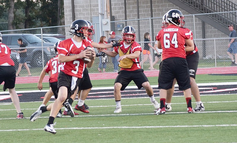 Blackhawk sophomore Cole Wright prepared to pass the football Friday night during the scrimmage of Pride Night.