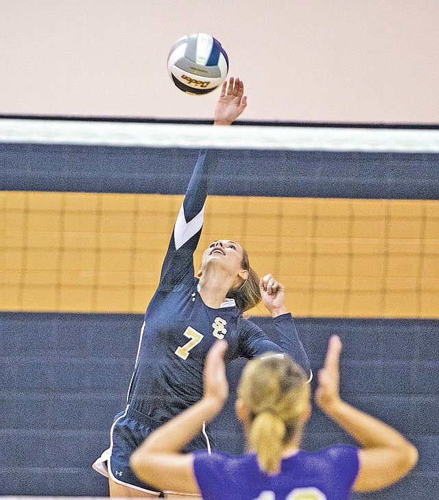  STAFF PHOTO ANTHONY REYES &#8226; @NWATONYR Reagan Robinson of Shiloh Christian goes for a kill against Berryville on Tuesday at Shiloh Champions Gym in Springdale. The Lady Saints won 3-0.