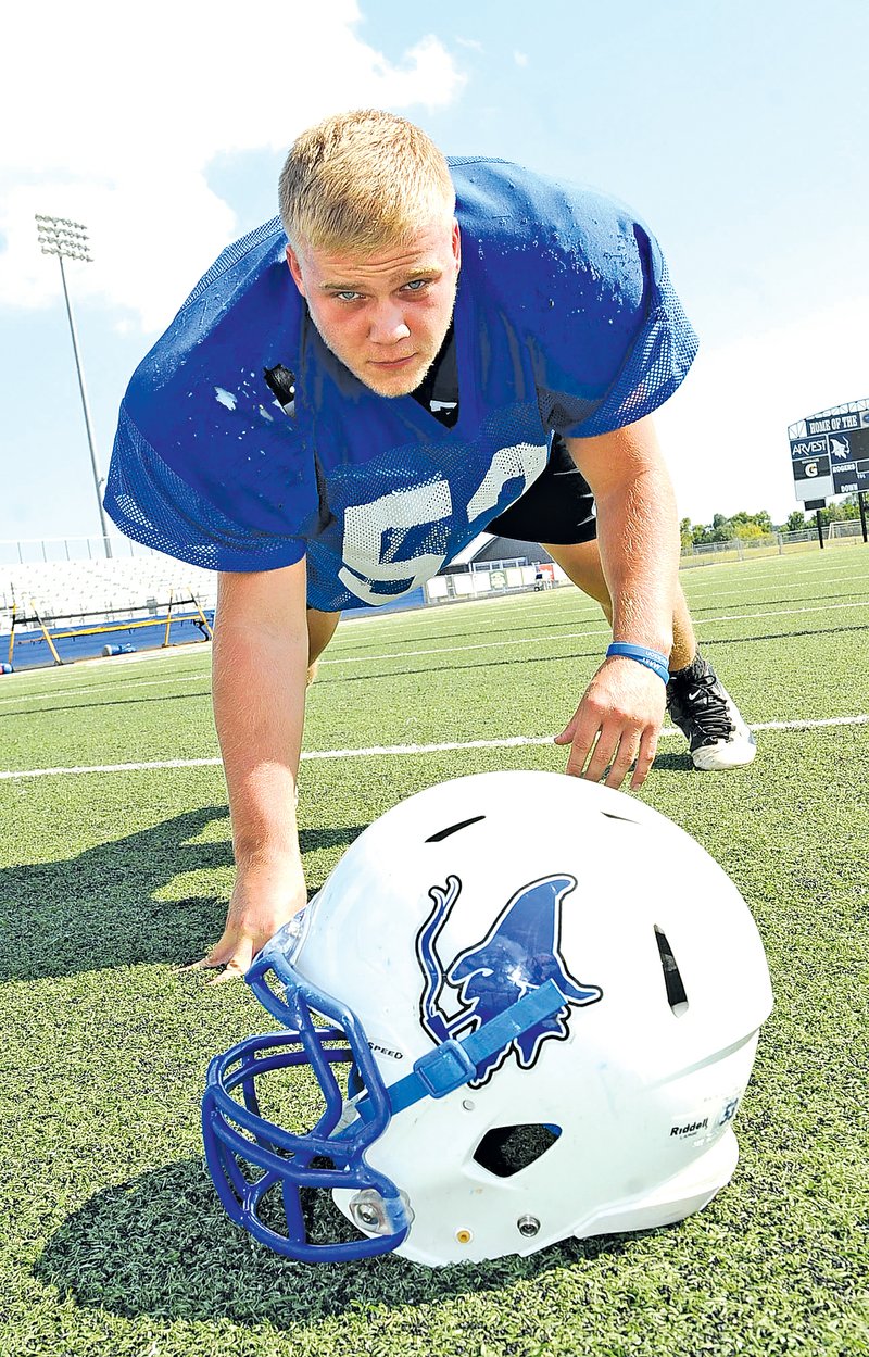  STAFF PHOTO FLIP PUTTHOFF Tanner Campbell returns as a starter on the defensive line for the Rogers High Mountaineers.