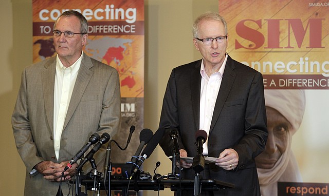 Will Elphick, (left) with SIM USA, and SIM President Bruce Johnson, talk about a doctor with the missionary group who contracted Ebola in Liberia.