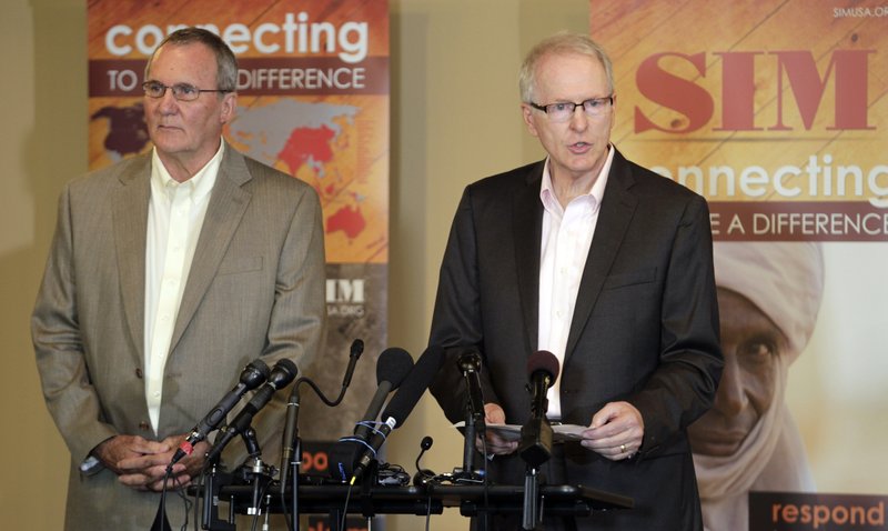 Will Elphick, (left) with SIM USA, and SIM President Bruce Johnson, talk about a doctor with the missionary group who contracted Ebola in Liberia.