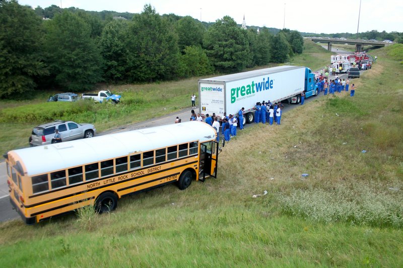 An accident involving a school bus along Interstate 40 eastbound at mile marker 153 slows traffic Thursday afternoon.