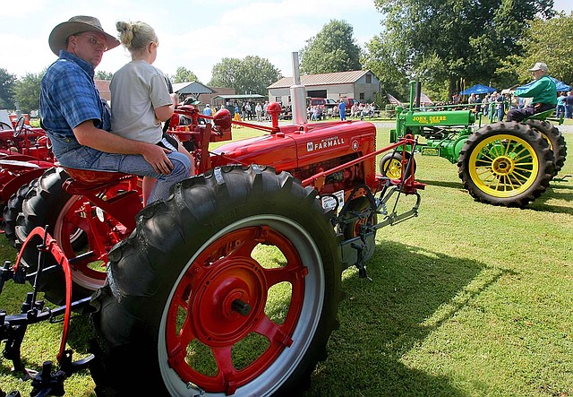 Tractors and antique engines line up every year for one big showand-tell at the Antique Tractor & Engine Show on the grounds of the Plantation Agriculture Museum in Scott.