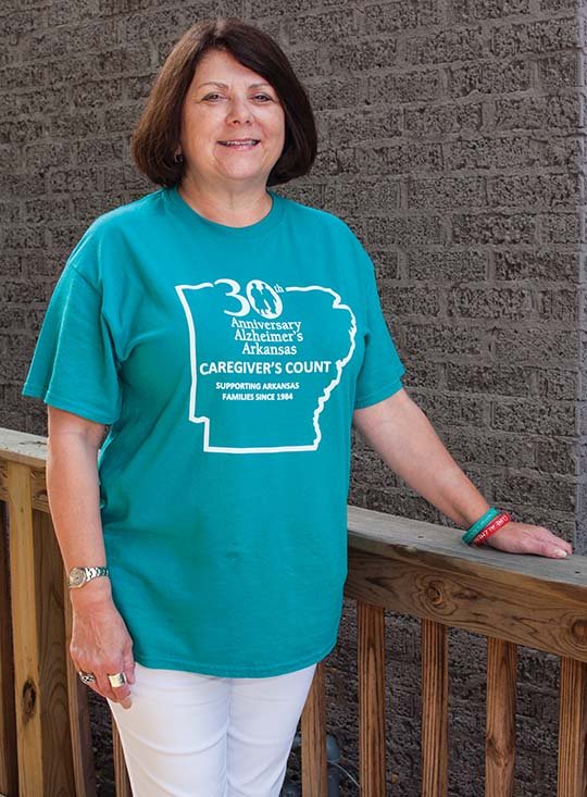 Melissa Longing wears this year’s T-shirt for the ninth annual Faulkner County Alzheimer’s Walk for Alzheimer’s Arkansas, which is celebrating its 30th anniversary. Early registration for the Conway event is Monday, and participants can also register at 8 a.m. Saturday, the day of the walk. Longing’s father and mother-in-law died of Alzheimer’s disease, and Longing said the walk is one way she can make a difference.