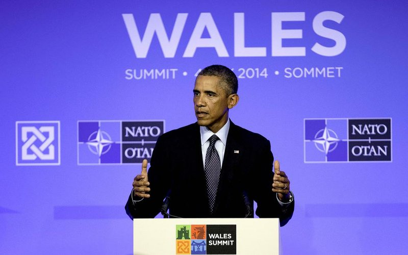 U.S. President Barack Obama speaks during a media conference after a NATO summit at the Celtic Manor Resort in Newport, Wales on Friday, Sept. 5, 2014. (AP Photo/Jon Super)