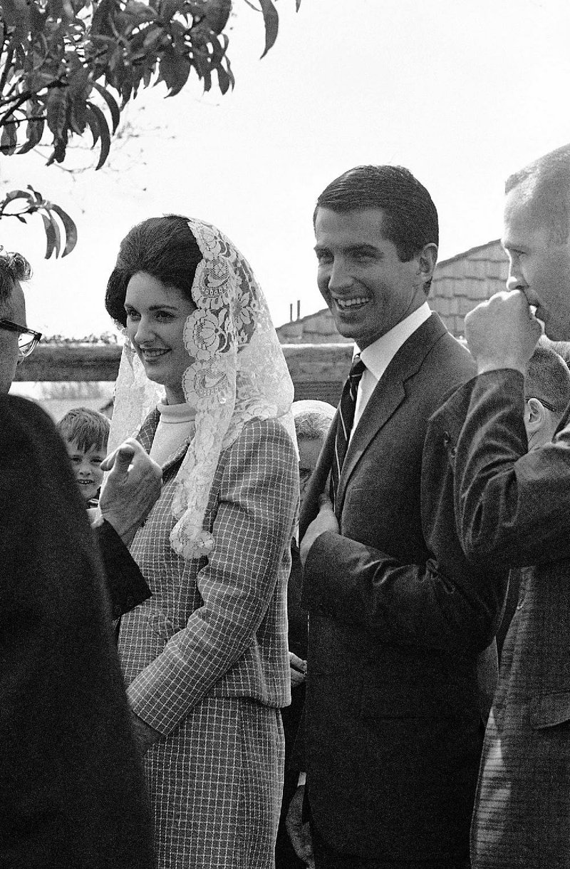 Lynda Bird Johnson and movie star George Hamilton accompanied the President and Mrs. Johnson to Easter Church services in Fredericksburg, Texas, April 10, 1966. Hamilton is the week-end guest of Lynda at the LBJ ranch. The President and Mrs. Johnson accompanied by daughters Lynda and Luci arrived for the 9am service at St. Barnabas Episcopal church. Pat Nugent fiancÈ of Luci and George Hamilton escorted the daughters into the church. (AP Photo)