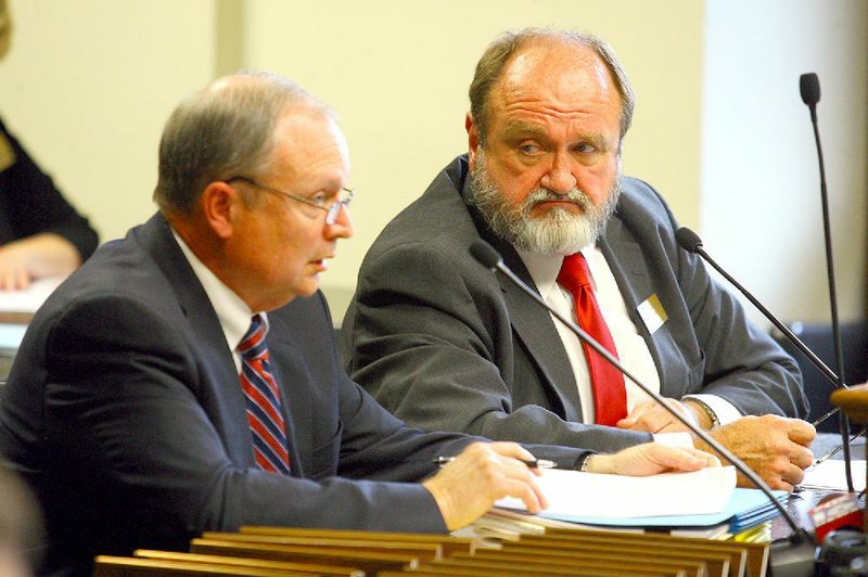 Arkansas Democrat-Gazette/STEPHEN B. THORNTON
4/12/2012
Pulaski County Special School District CFO William "Bill" Goff left, and Superintendent Dr. Jerry Guess answer questions from the legislative committee on educational institutions Thursday afternoon at the state capitol.