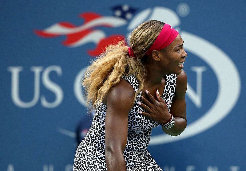 Serena Williams, reacts after defeating  Caroline Wozniacki, of Denmark, during the championship match of the 2014 U.S. Open tennis tournament, Sunday, Sept. 7, 2014, in New York. (AP Photo/Mike Groll)