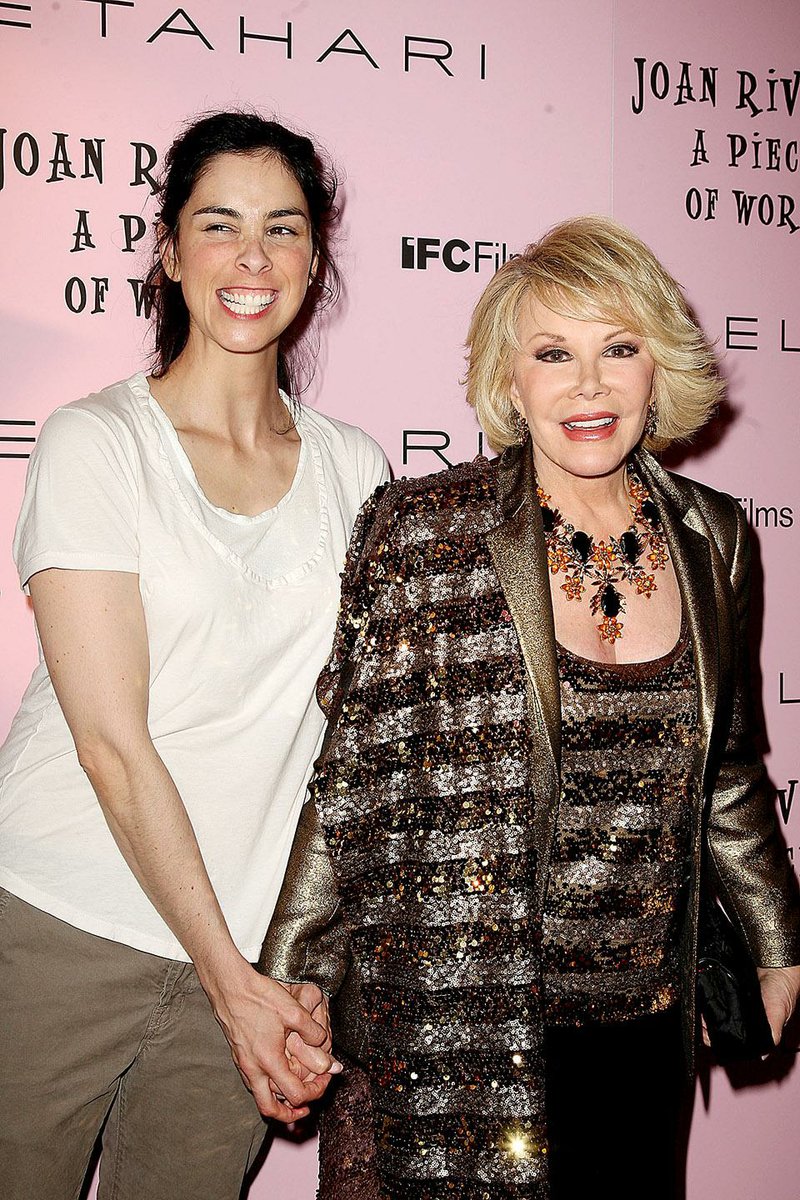 FILE - In this May 23, 2010 file photo released by Starpix, comedians Sarah Silverman, left, and Joan Rivers pose during arrivals at the New York premiere of "Joan Rivers - A Piece of Work," in New York. Rivers, the raucous, acid-tongued comedian who crashed the male-dominated realm of late-night talk shows and turned Hollywood red carpets into danger zones for badly dressed celebrities,  died Thursday, Sept. 4, 2014. She was 81. Rivers was hospitalized Aug. 28, after going into cardiac arrest at a doctor's office. (AP Photo/Starpix, Amanda Schwab, File)